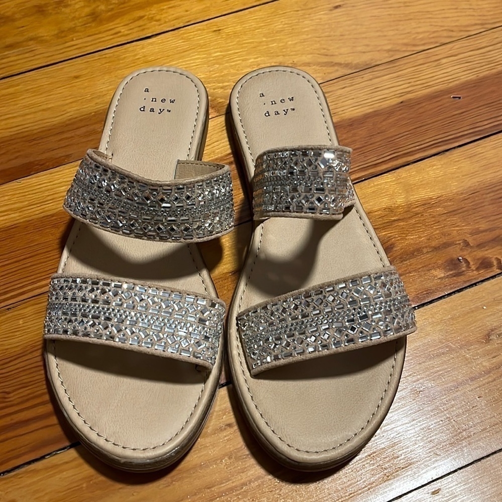 A New Day Cream and Silver Sandals with Crystal Embellishments